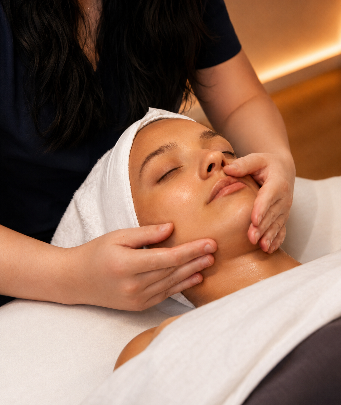 Anti-aging serum on fingertips during professional facial at Life Massage & Wellness Portsmouth NH