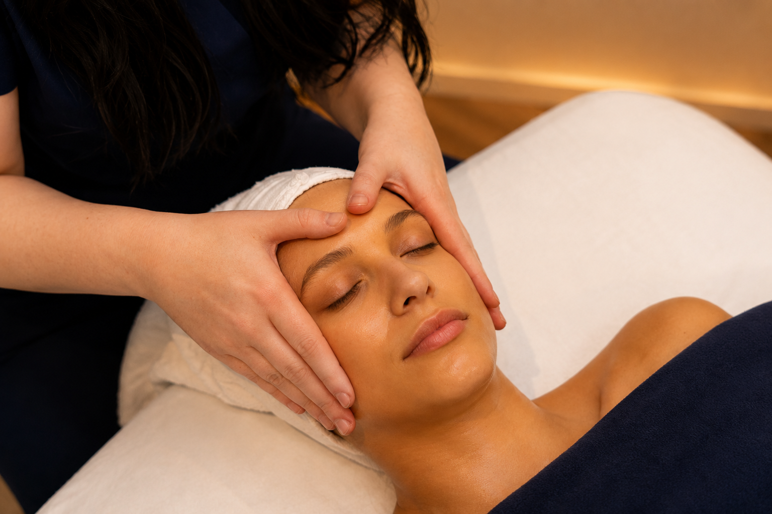 CranioSacral Therapy practitioner cradling head and neck at Life Massage & Wellness Portsmouth NH