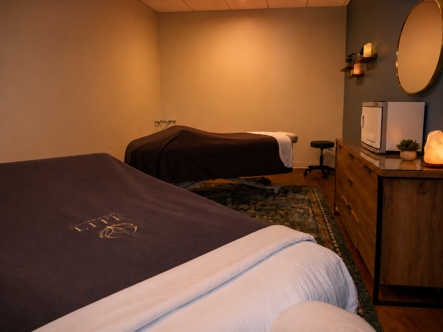 Two side-by-side massage tables set for a couples massage at Life Massage & Wellness Portsmouth NH
