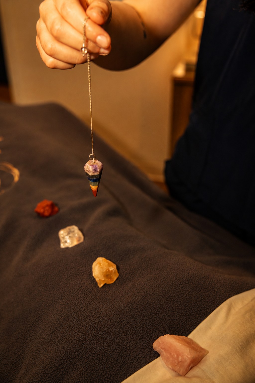 Pendulum and crystals sometimes used during an intuitive session