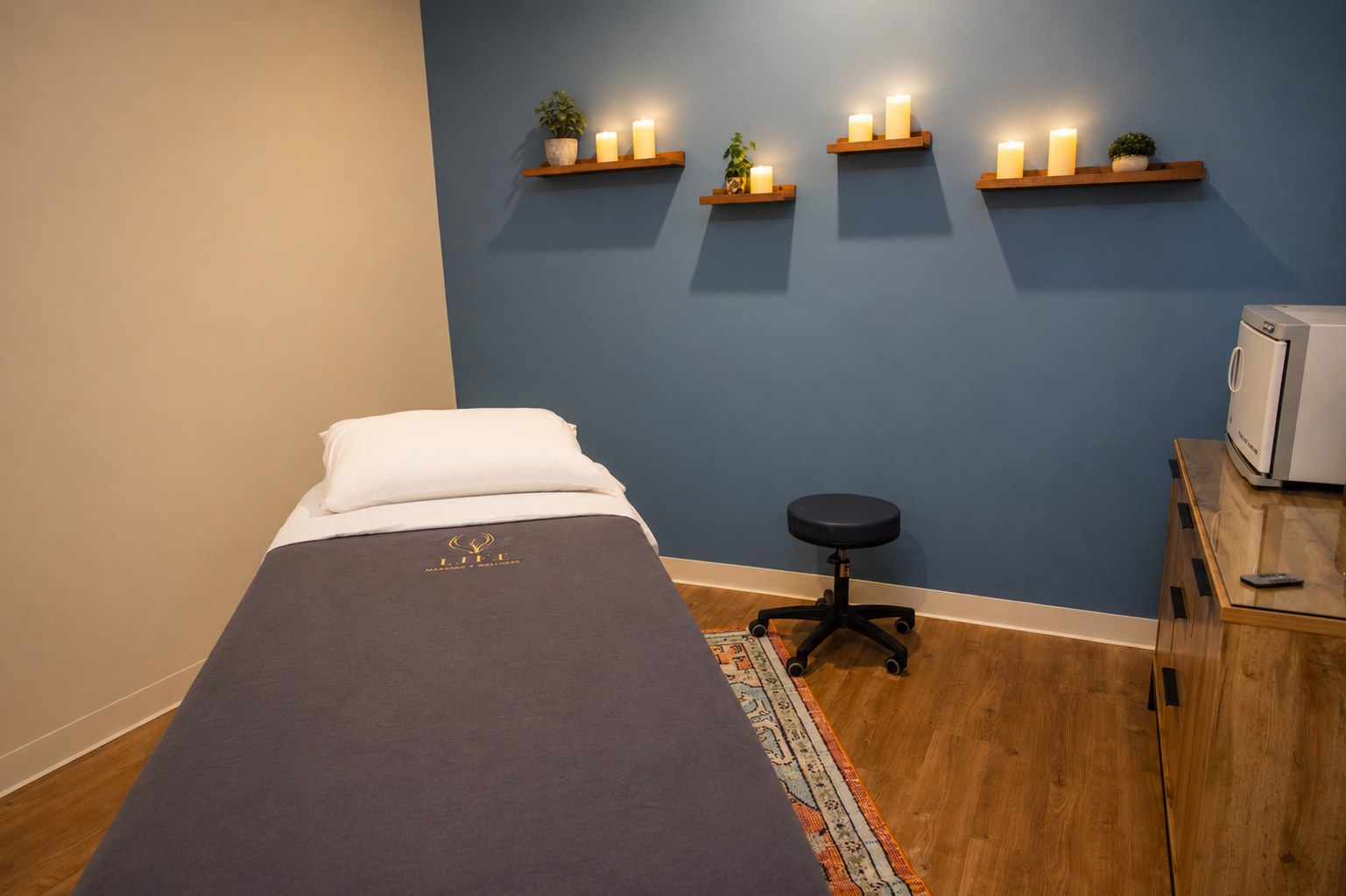 Candlelit private treatment room at the Portsmouth studio